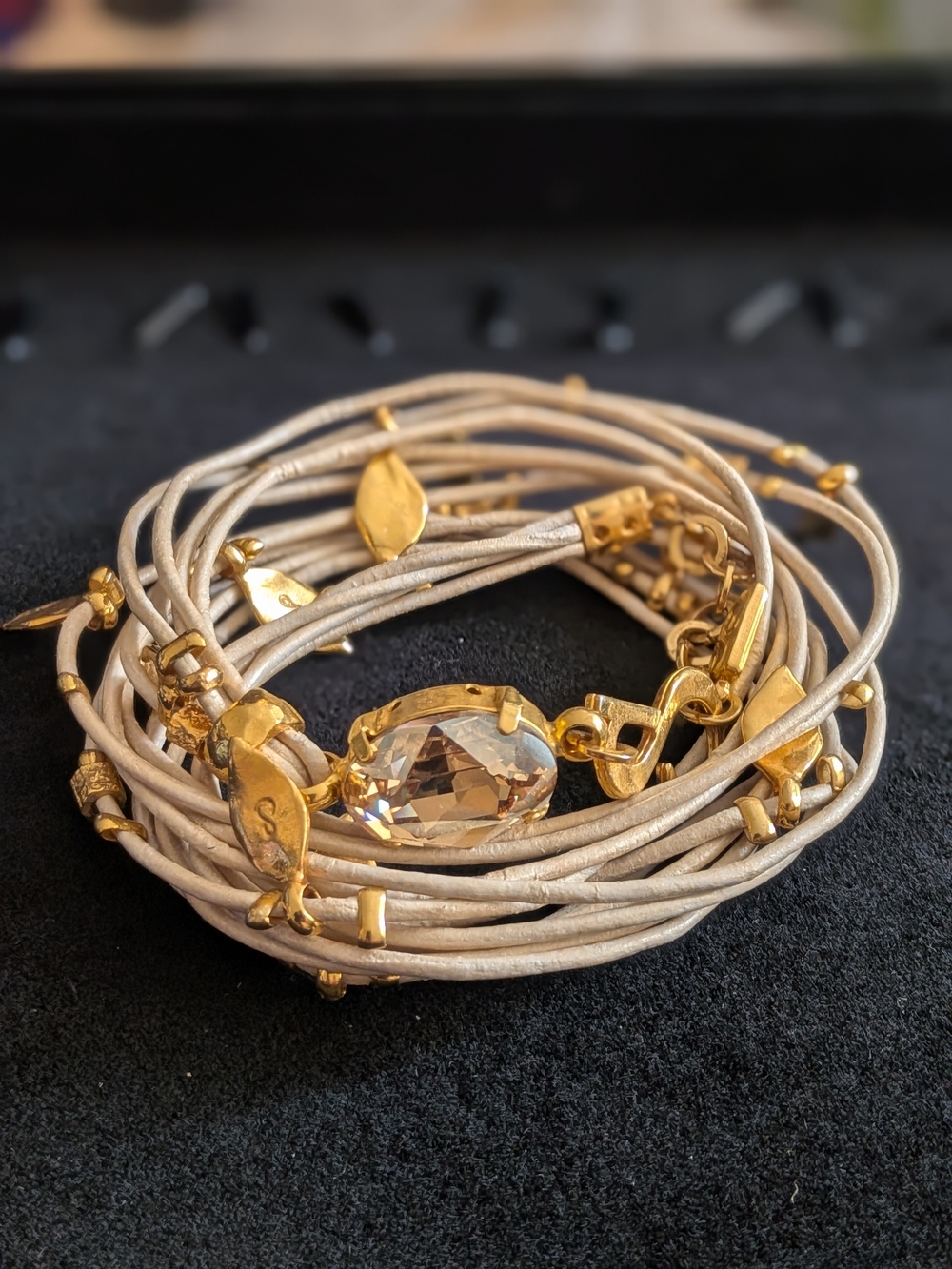 Smadar Eliasaf (SEA) wrap-around leather bracelet features multiple light-color